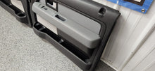 Load image into Gallery viewer, 2009-2014 Ford F-150 XLT Super Cab Front Door Panel Set Black/ Grey OEM1