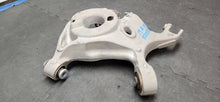 Load image into Gallery viewer, 2015-2023 Ford Mustang GT RH Passenger Rear Lower Spring Mount OEM
