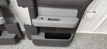 Load image into Gallery viewer, 2009-2014 Ford F-150 XLT Super Cab Rear Door Panel Set Black/Grey OEM2
