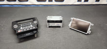 Load image into Gallery viewer, 2015-2017 Ford Mustang GT Face Plate, Screen, Radio, Sync2 OEM0
